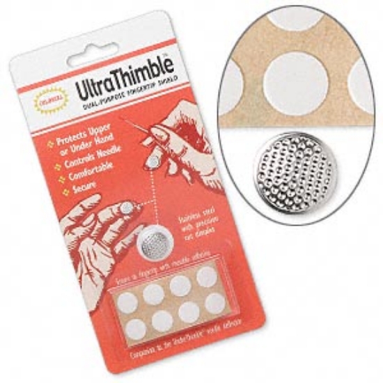 Picture of UltraThimble steel protector with reusable adhesive pads. 