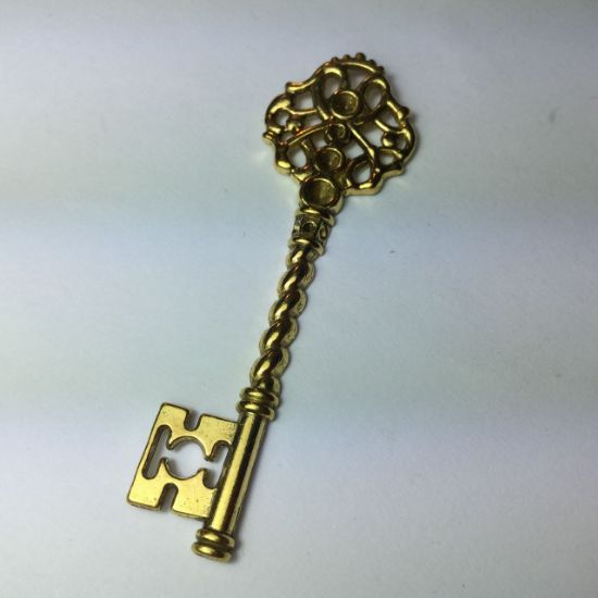 Picture of Charm Key 60x21mm Antiqued Gold x5