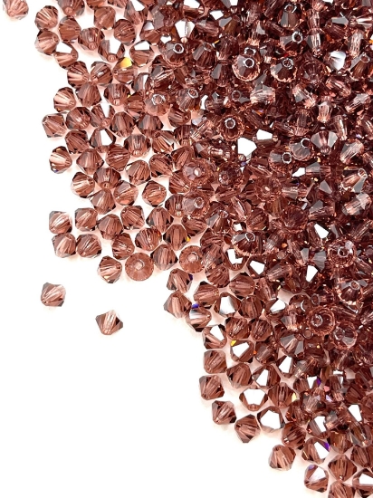 Picture of Preciosa Bead Rondell 4mm Light Burgundy x100