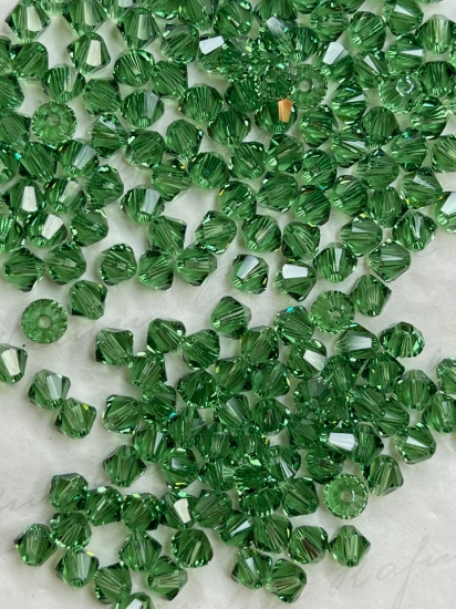 Picture of Swarovski 5328 Xilion Bead 4mm Erinite x100