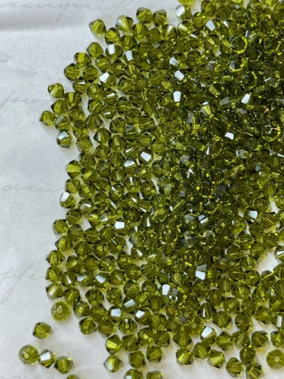 Picture of Swarovski 5328 Xilion Bead 3mm Olivine x100