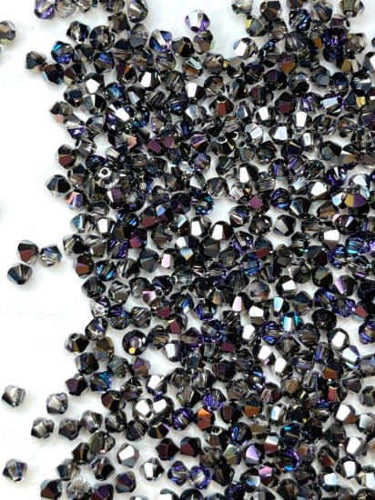 Afbeeldingen van Swarovski 5328 Xilion Bead 3mm Crystal Heliotrope x42