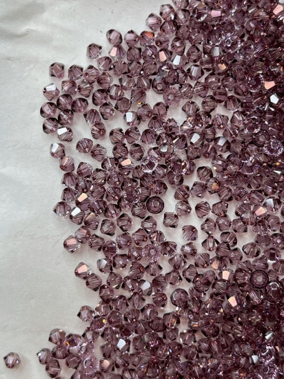 Picture of Swarovski 5328 Xilion Bead 3mm Crystal Antique Pink x100