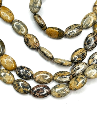 Picture of Leopardskin Jasper 8x12mm puff oval x38cm 