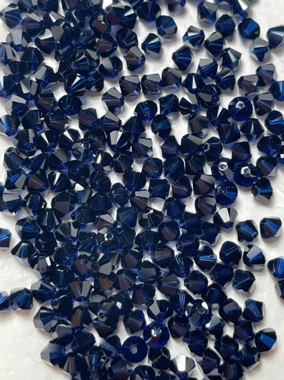 Picture of Swarovski 5328 Xilion Bead 4mm Dark Indigo x100