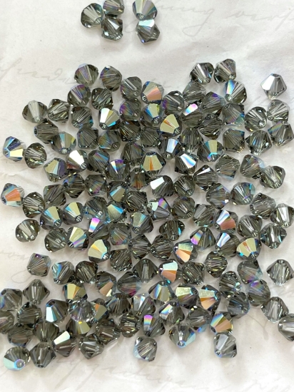 Picture of Swarovski 5328 Xilion Bead 4 mm Black Diamond AB x100
