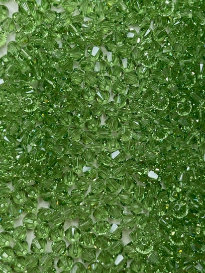 Picture of Swarovski 5328 Xilion Bead 4mm Peridot x100