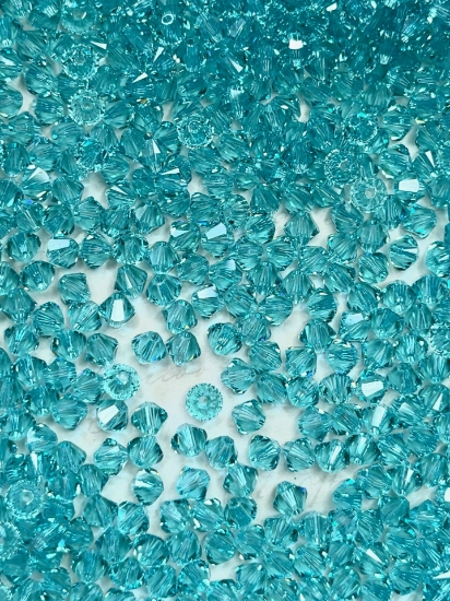 Picture of Swarovski 5328 Xilion Bead 4mm Light Turquise x100