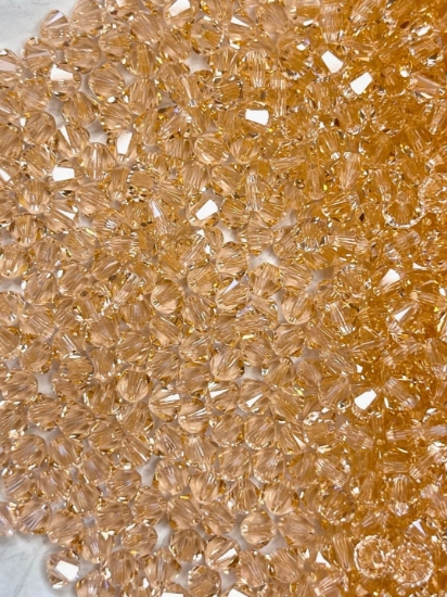 Picture of Swarovski 5328 Xilion Bead 4mm Light Peach x100