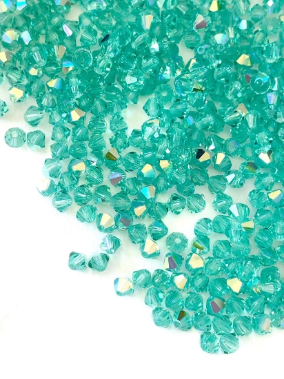Picture of Preciosa Bead Rondell 4mm Caribbean Sea AB x100