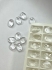 Picture of Rose Sew-on stone flat 2-hole 10x7mm Crystal UF x10