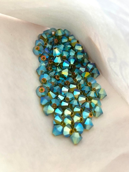 Picture of Preciosa Bead Rondell 4mm Olivine AB2X x100