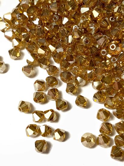 Picture of Preciosa Bead Rondell 4mm Crystal Golden Flare Full x100