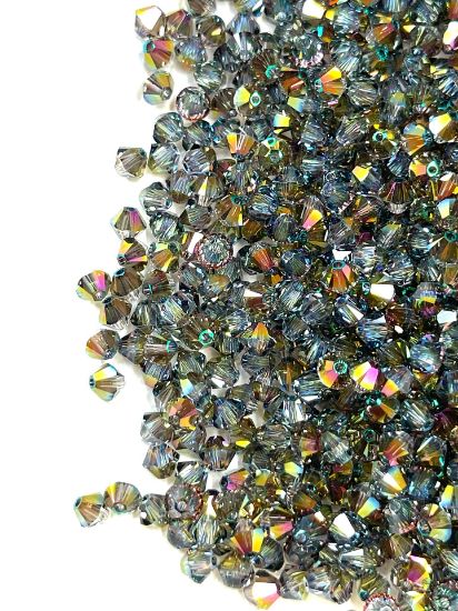Picture of Swarovski 5328 Xilion Bead 4 mm Crystal Iridescent Green x100
