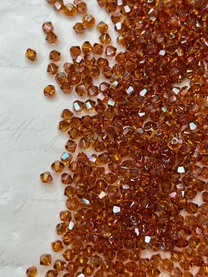Picture of Swarovski 5328 Xilion Bead 3mm Crystal Copper x100