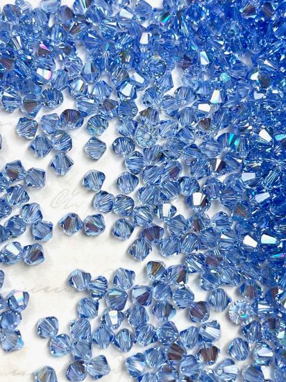 Picture of Swarovski 5328 Xilion Bead 4 mm Light Sapphire Shimmer x100