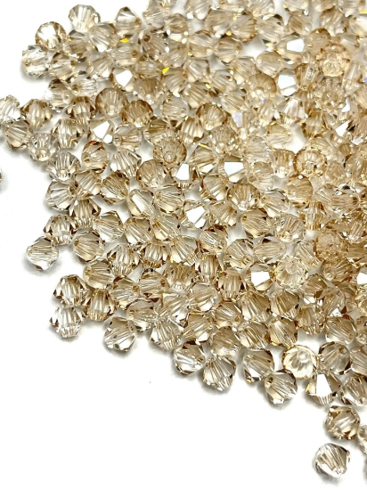 Picture of Preciosa Bead Rondell 4mm Crystal Honey x100 