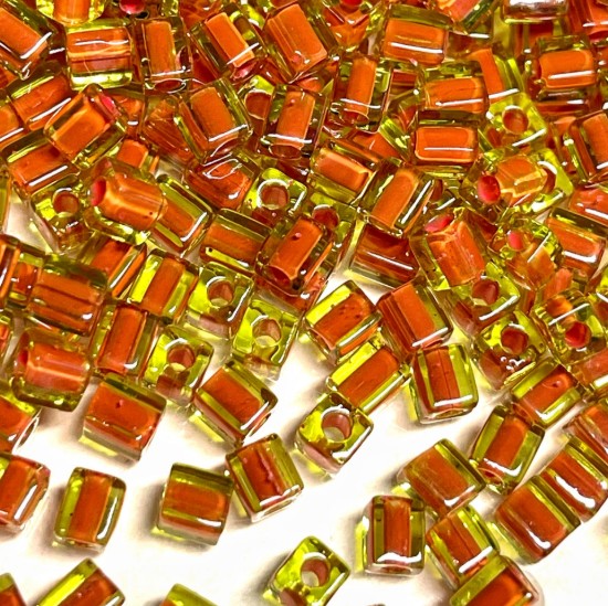 Bild von Miyuki Cubes 4mm 2630 Color-Lined Green/Orange x10g