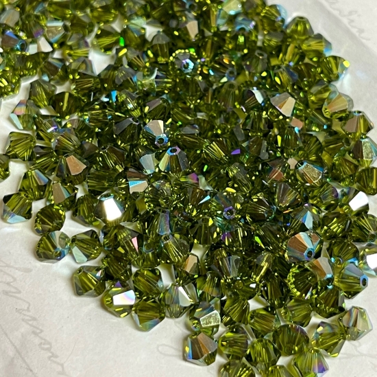 Picture of Swarovski 5328 Xilion Bead 4mm Olivine AB x100
