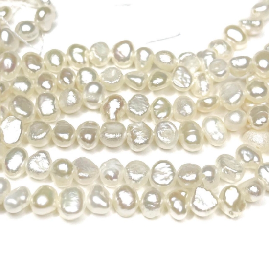 Picture of Pearl Cultured Freshwater Oval 4x6mm hole 0,7mm x35cm 