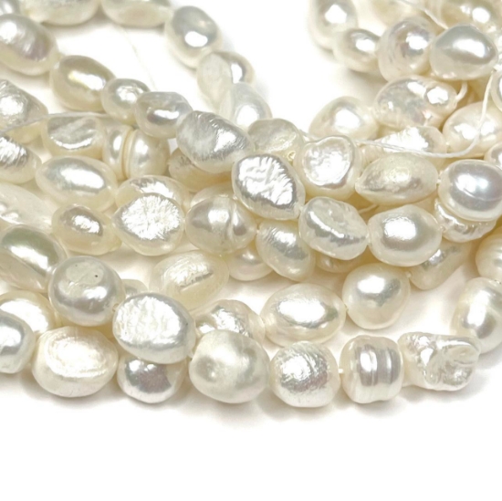Picture of Pearl Cultured Freshwater Oval 8~10x7~8m hole 0,5mm x35cm 