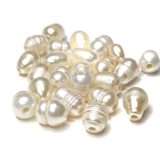Picture of Pearl Cultured Freshwater Oval 7~10x7~8mm hole 1,8mm x10