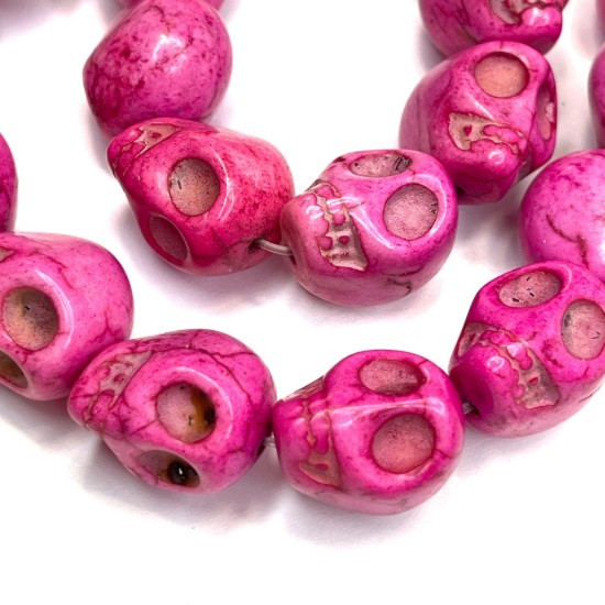 Picture of Synthetic Turquoise Skull 18x17mm Magenta x10