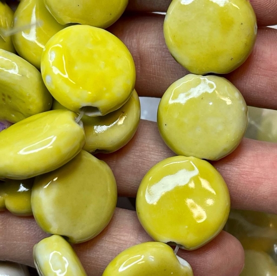 Picture of Bead, porcelain, yellow, 18-19mm puffed flat round x38cm