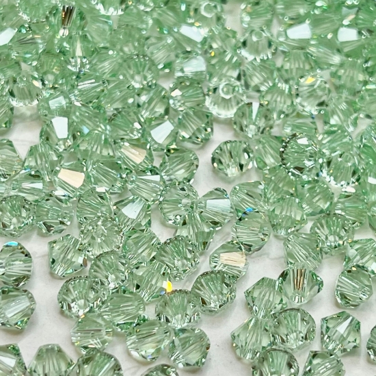 Picture of Swarovski 5328 Xilion Bead 4mm Chrysolite x100
