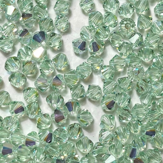 Picture of Swarovski 5328 Xilion Bead 4mm Chrysolite AB x100