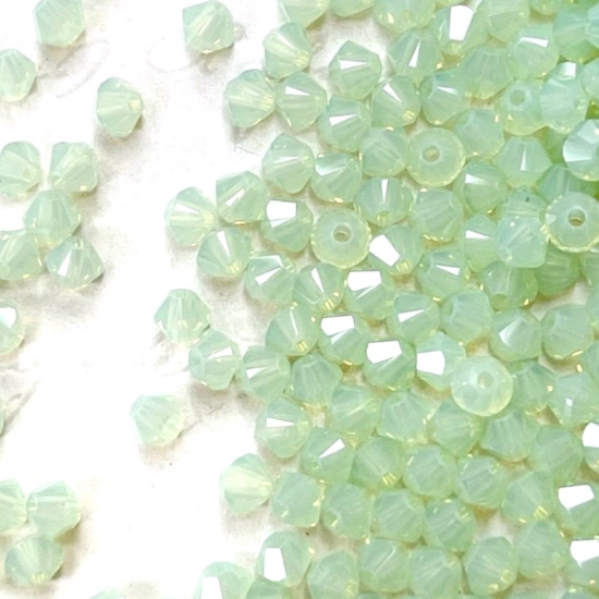 Picture of Swarovski 5328 Xilion Bead 3mm Chrysolite Opal x100