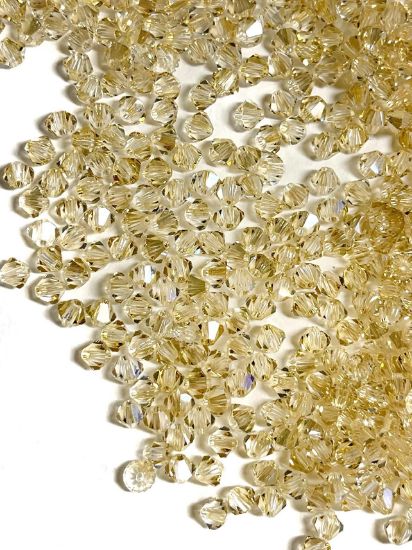 Picture of Preciosa Bead Rondell 4mm Crystal Blond Flare x100