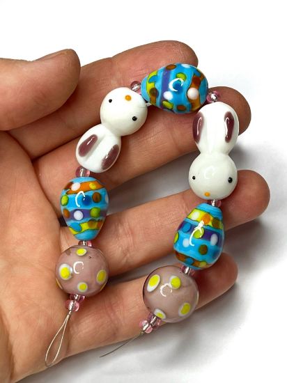 Picture of Select Strands™ Lampworked Glass Egg & Bunny x1