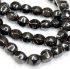 Picture of Hematite (manmade) 8mm 6-sided round x38cm