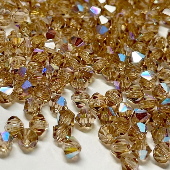 Afbeeldingen van Preciosa Bead Rondell 4mm Light Colorado Topaz Glitter x21