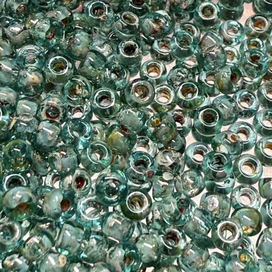Picture of Miyuki Rocaille 8/0 4506 Picasso Olivine Transparant x10g