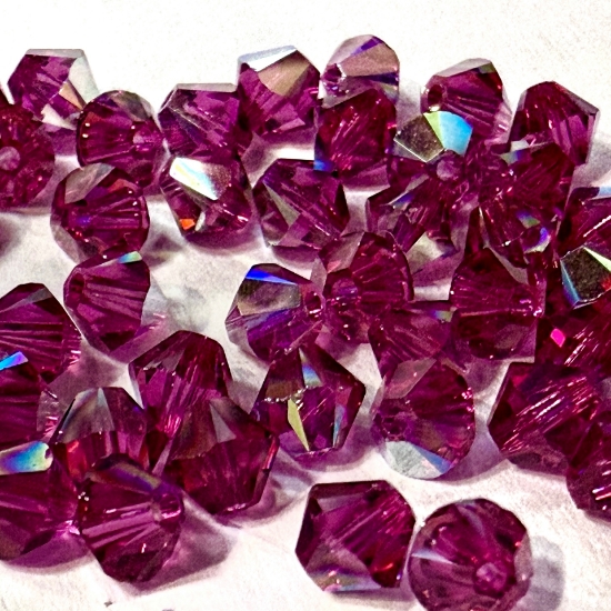 Picture of Swarovski 5328 Xilion Bead 4mm Fuchsia AB x50