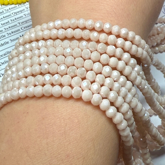 Picture of Faceted Rondelle 3x4mm Cream x40cm