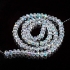 Picture of Faceted Rondelle 3x4mm Crystal AB x40cm