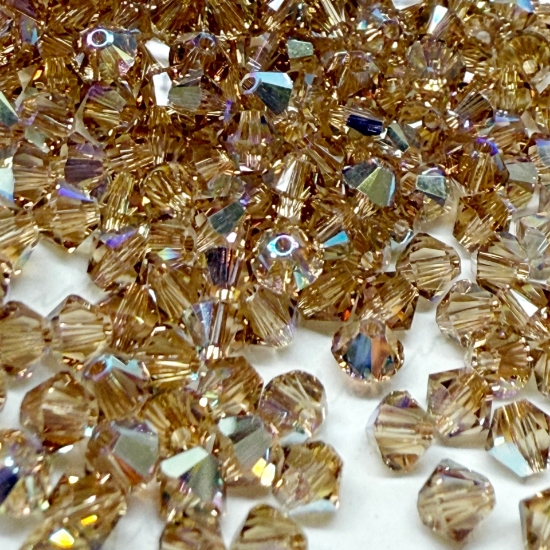 Picture of Swarovski 5328 Xilion Bead 4mm Light Colorado Topaz AB x100