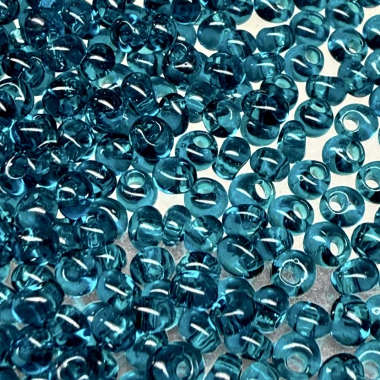 Afbeeldingen van Toho Magatama 3mm 7BD Transparent Capri Blue x7g