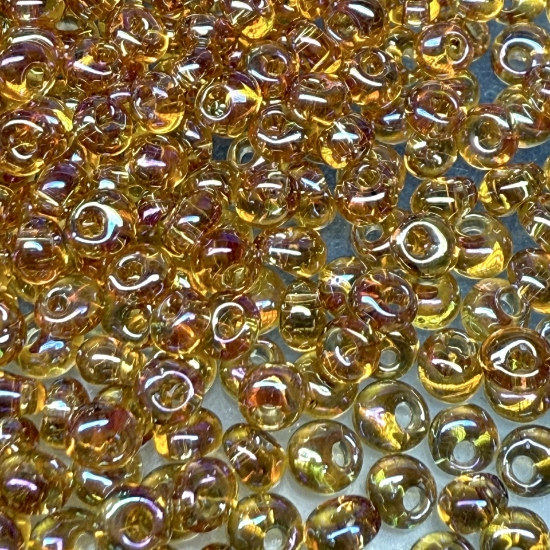 Picture of Toho Magatama 3mm 162C Transparent Rainbow Topaz x10g