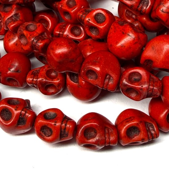 Bild von Synthetic Magnesite Skull 10x8mm Red x10