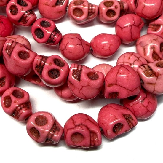 Bild von Synthetic Magnesite Skull 10x8mm Pink x10