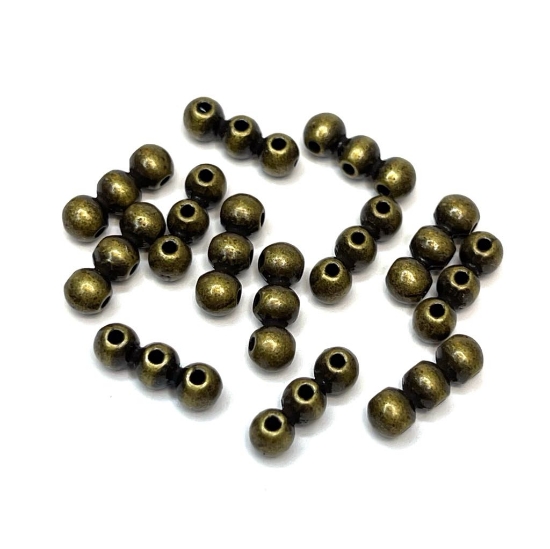 Picture of Spacer Metal Bead 12x4mm 3-hole Bronze x1