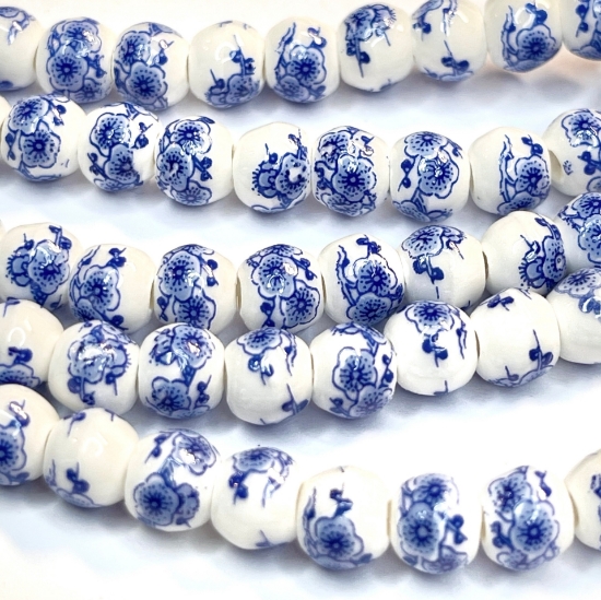 Picture of Porcelain bead 6mm round Blue flowers x32cm 