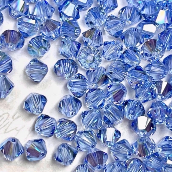 Picture of Swarovski 5328 Xilion Bead 4 mm Light Sapphire Shimmer x100